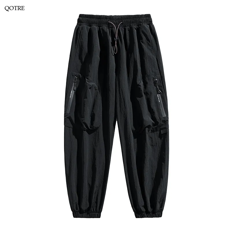 Tapered Zippered Pocket Solid Color Cargo Pants